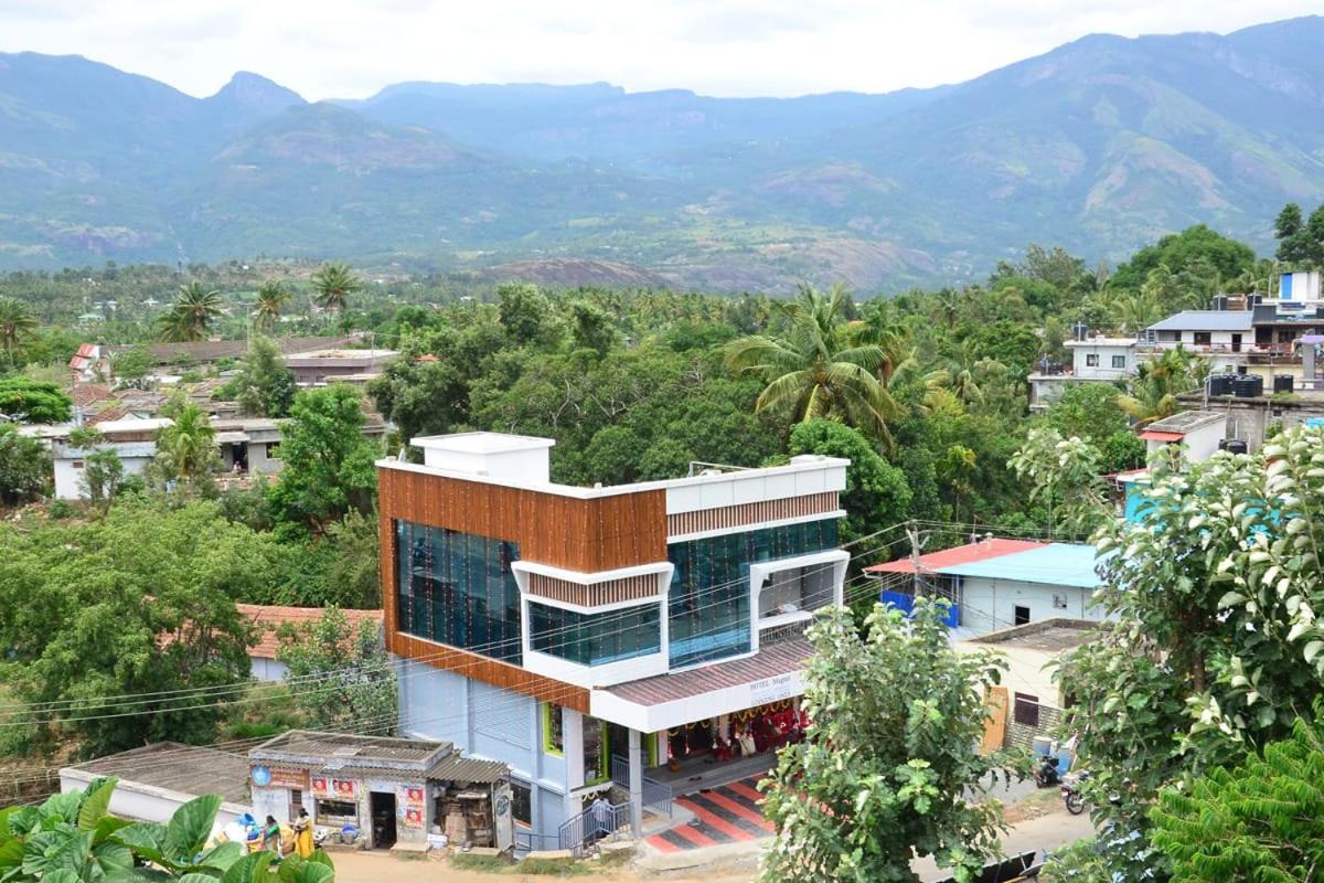 Hotel Magnet Maraiyur Bagian luar foto